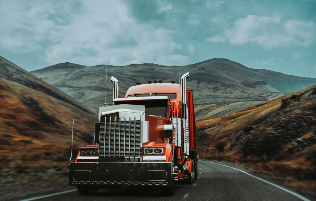 semi truck moving through the mountains - what is truck factoring